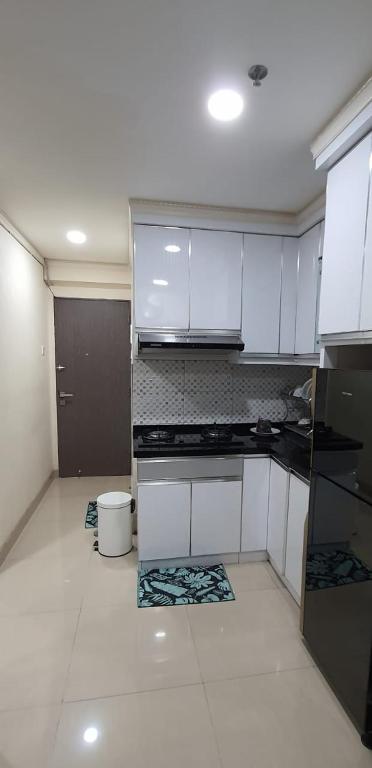 Affordable rooms with wifi & Netflix at sentra timur resindence by.Rizky properti