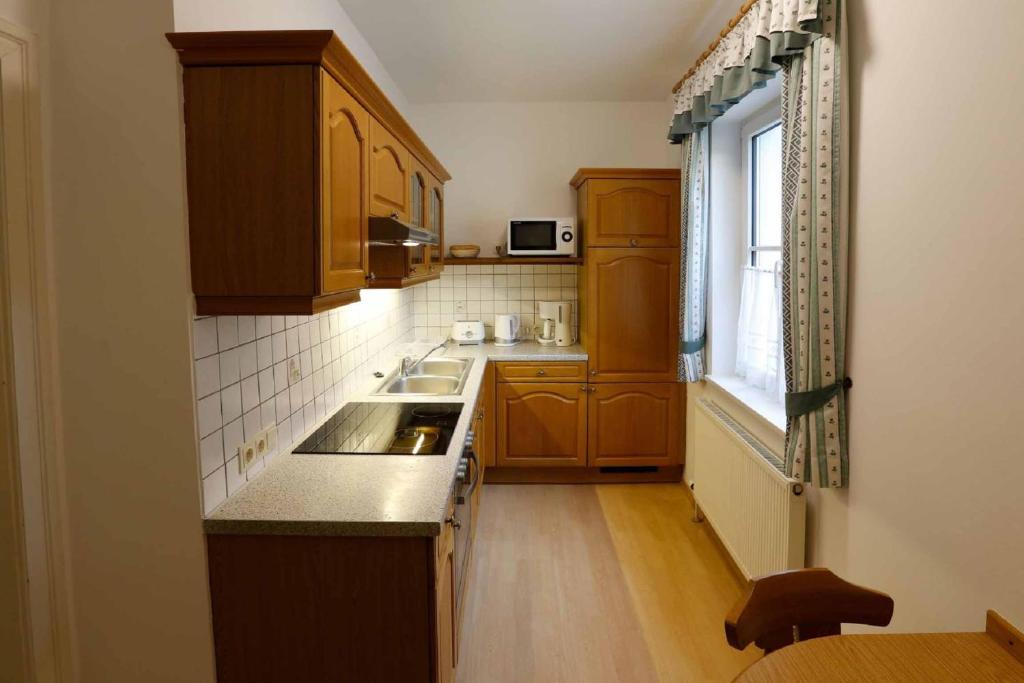Kuchyň nebo kuchyňský kout v ubytování Gästehaus Huber