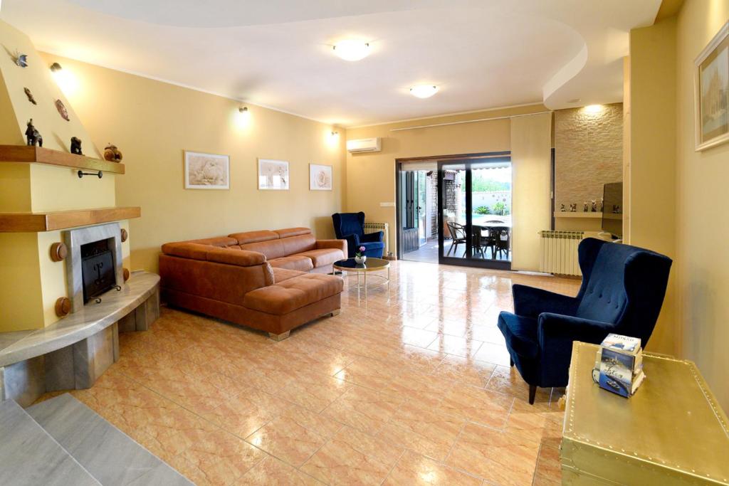 Część wypoczynkowa w obiekcie Holiday Home Villa Margherita