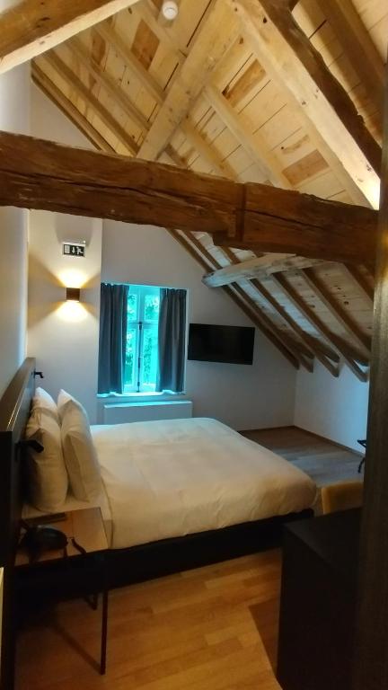 Postel nebo postele na pokoji v ubytování Hotel Kronacker