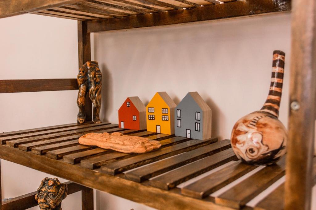 a shelf with houses and a loaf of bread on it at Kaş Old Town Hotel in Kaş