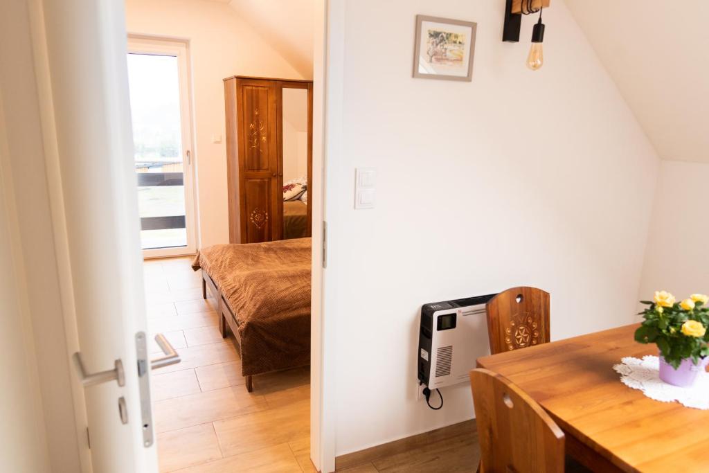 Posteľ alebo postele v izbe v ubytovaní Apartamenty Home&Spa