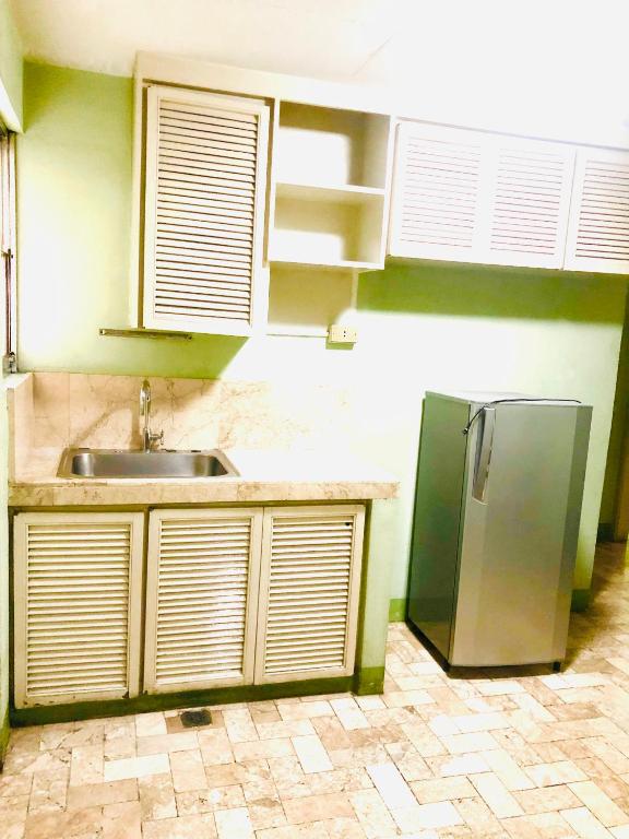 Kuchyň nebo kuchyňský kout v ubytování Benson Hotel San Juan CIty