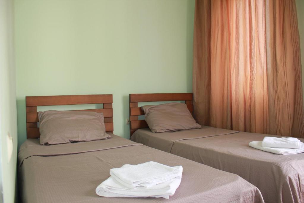 Voodi või voodid majutusasutuse Hotel Premium toas