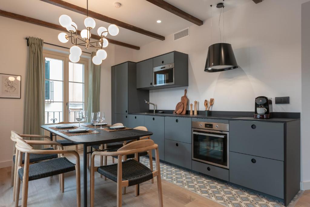 Kuchyň nebo kuchyňský kout v ubytování Exclusive Penthouse in PLaza La Merced