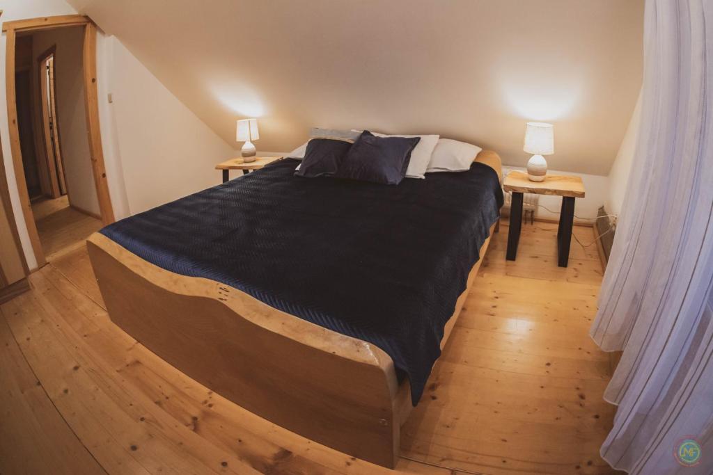 Postel nebo postele na pokoji v ubytování Stara Chata w Beskidach