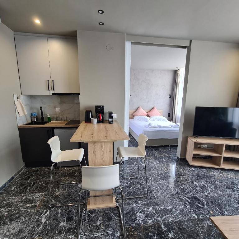 Telewizja i/lub zestaw kina domowego w obiekcie Ladadika 5th Floor