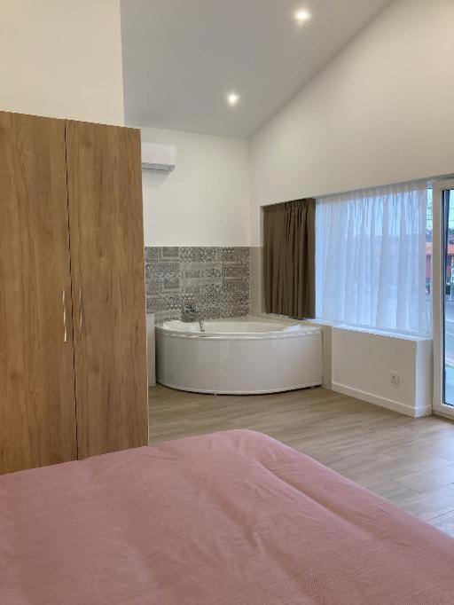 Postel nebo postele na pokoji v ubytování Villas Camargo.suites