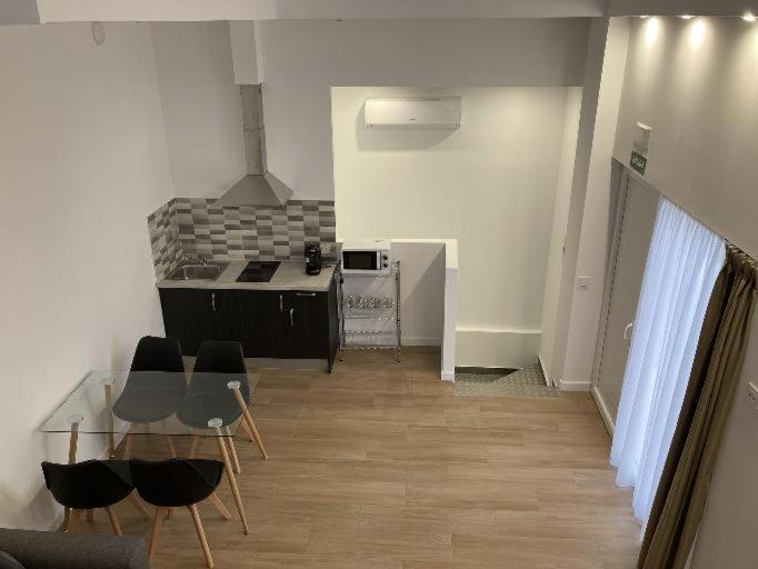 Kuchyň nebo kuchyňský kout v ubytování Villas Camargo.suites