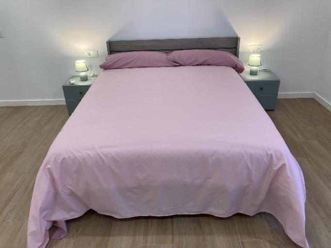 Postel nebo postele na pokoji v ubytování Villas Camargo.suites