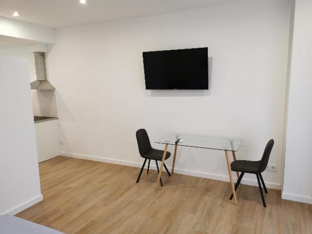 TV a/nebo společenská místnost v ubytování Villas Camargo.suites