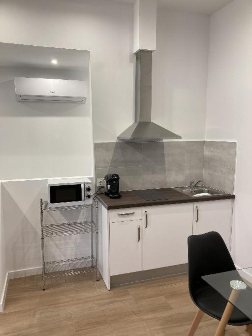 Kuchyň nebo kuchyňský kout v ubytování Villas Camargo.suites