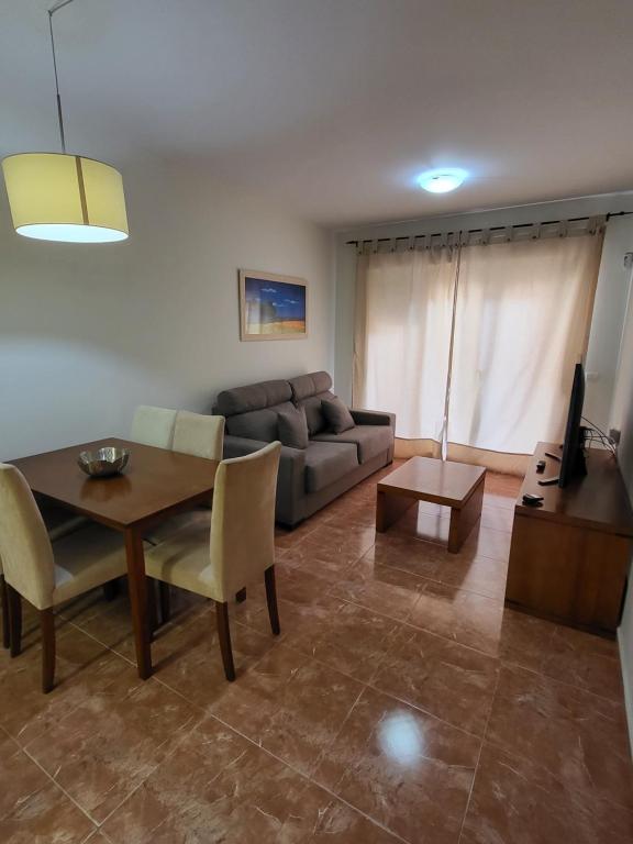 Posedenie v ubytovaní ¡Apartamento cerca de la piscina en paraíso de Vera!