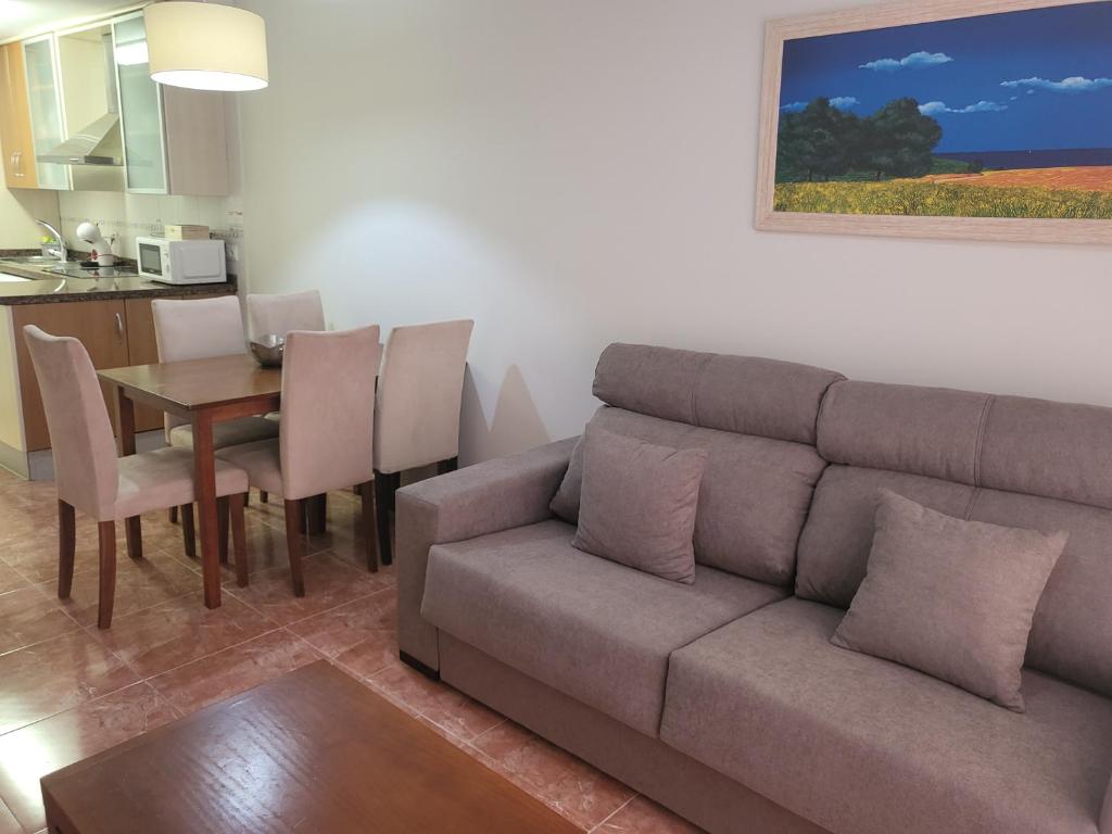 Posedenie v ubytovaní ¡Apartamento cerca de la piscina en paraíso de Vera!