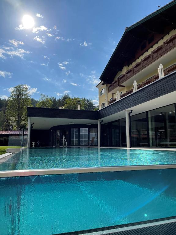 The swimming pool at or close to Hotel Ennstalerhof