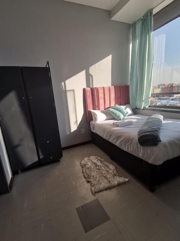 Lovely bachelor apartment with free outdoor parking (ZuidAfrika