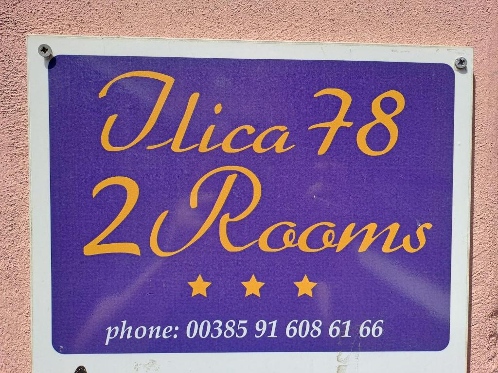 a sign for a zona zona rooms at Guest House Ilica2rooms in Zagreb