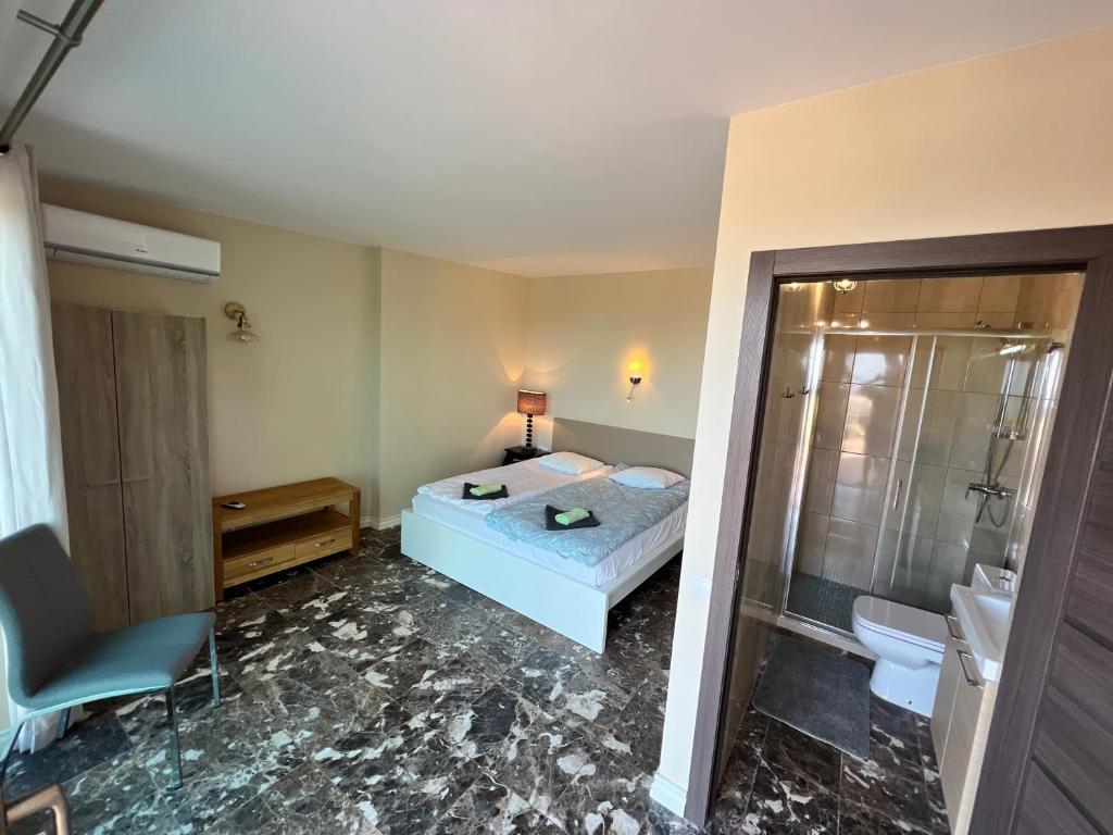 Posteľ alebo postele v izbe v ubytovaní Olta 5 Sea View RESORT
