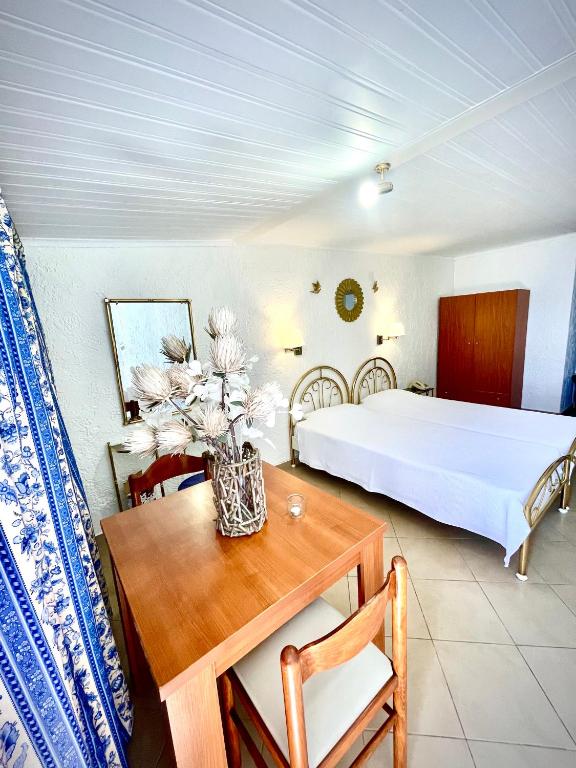 Posteľ alebo postele v izbe v ubytovaní Kommeno Bay Apartments
