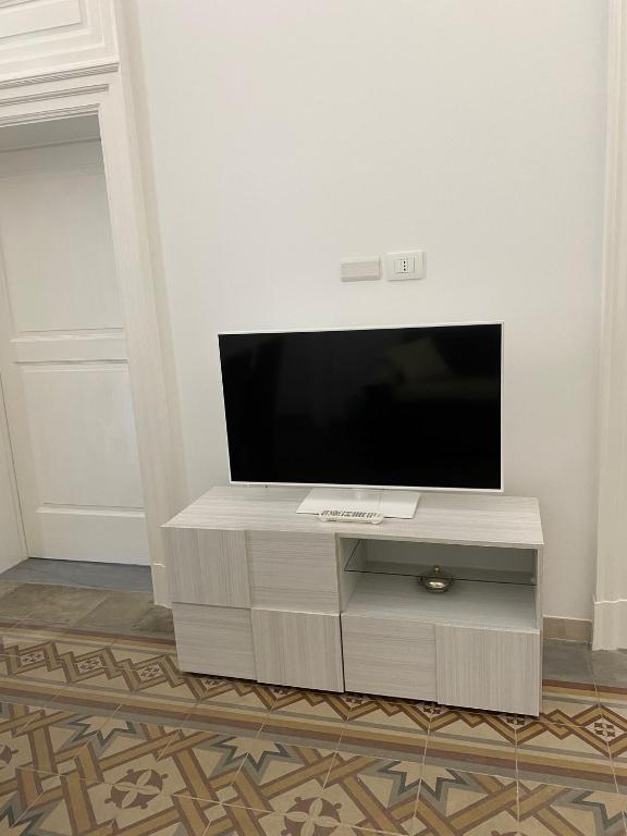 TV a/nebo společenská místnost v ubytování M.Mansion