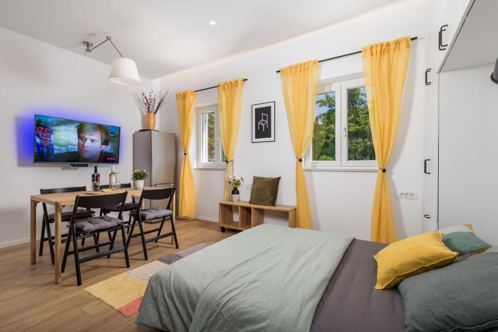 TV a/nebo společenská místnost v ubytování Trsat Central Apartments