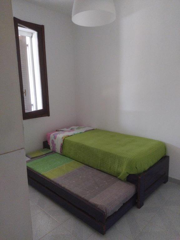 Postel nebo postele na pokoji v ubytování Casa Olea
