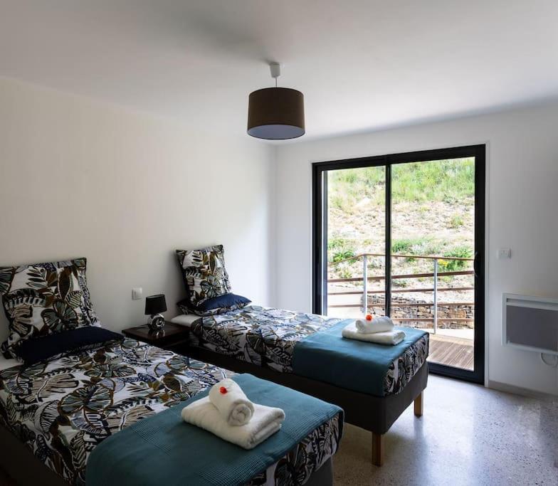 Posteľ alebo postele v izbe v ubytovaní Villa Blanche, Contemporary, Cathars, Couiza, Carcassonne