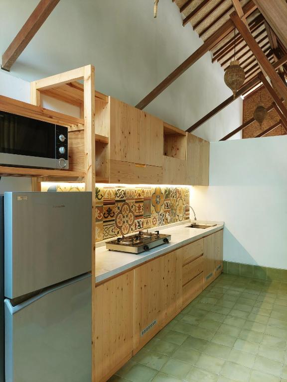 Kuchyň nebo kuchyňský kout v ubytování Komoreya Guesthouse