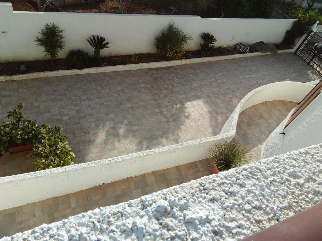an overhead view of a patio with plants at Villa Anna Maria in Polignano a Mare