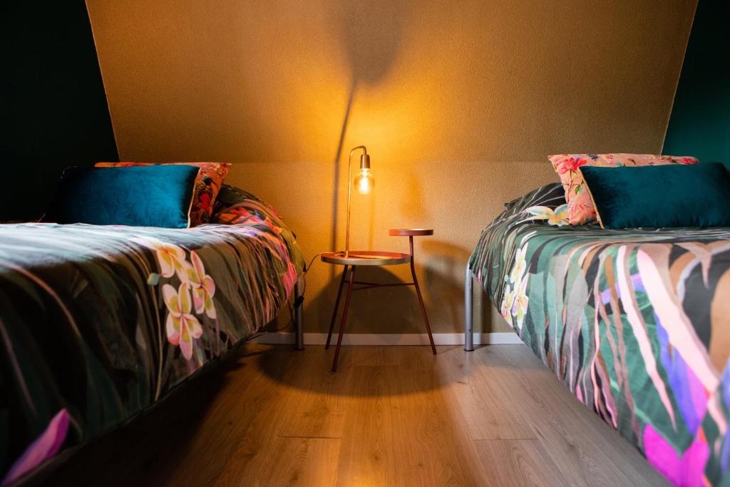 Postel nebo postele na pokoji v ubytování Bosserheide