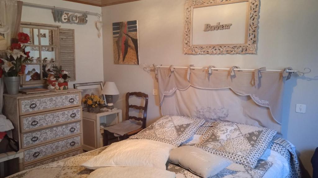 Posteľ alebo postele v izbe v ubytovaní Chambre d'hôtes