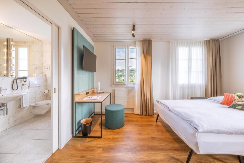 Postel nebo postele na pokoji v ubytování Boutique Hotel Balm