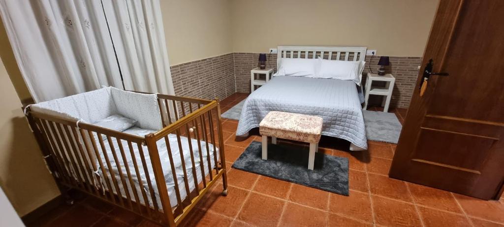 Postel nebo postele na pokoji v ubytování Apartamento Turistico "El Rincón de la Pernila"