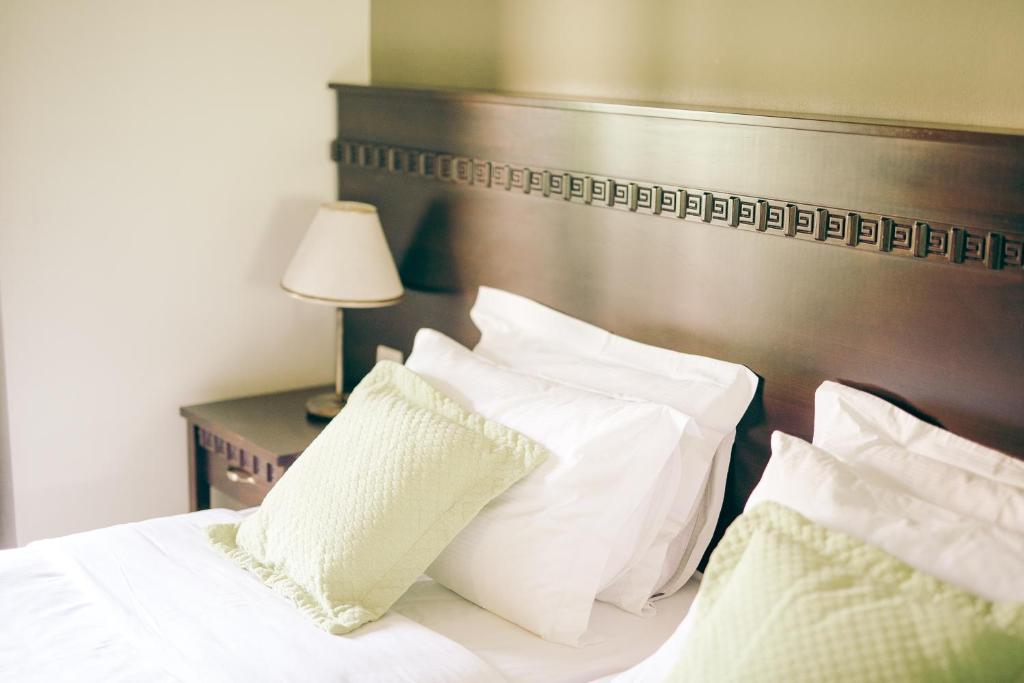 Postel nebo postele na pokoji v ubytování Althaia Hotel