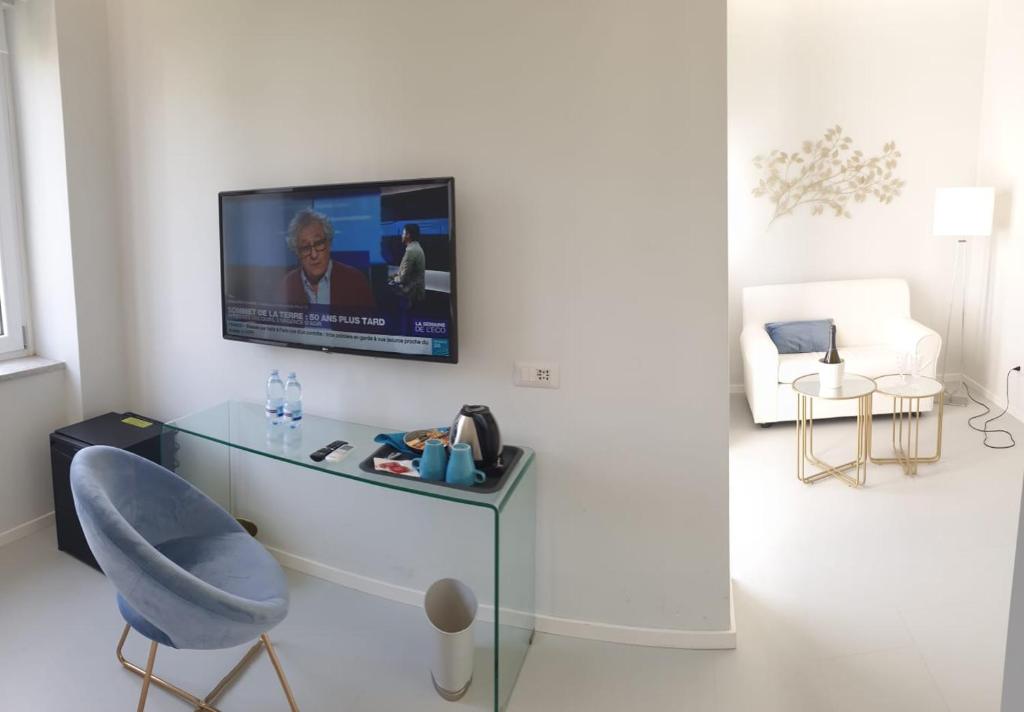 TV a/nebo společenská místnost v ubytování Younique