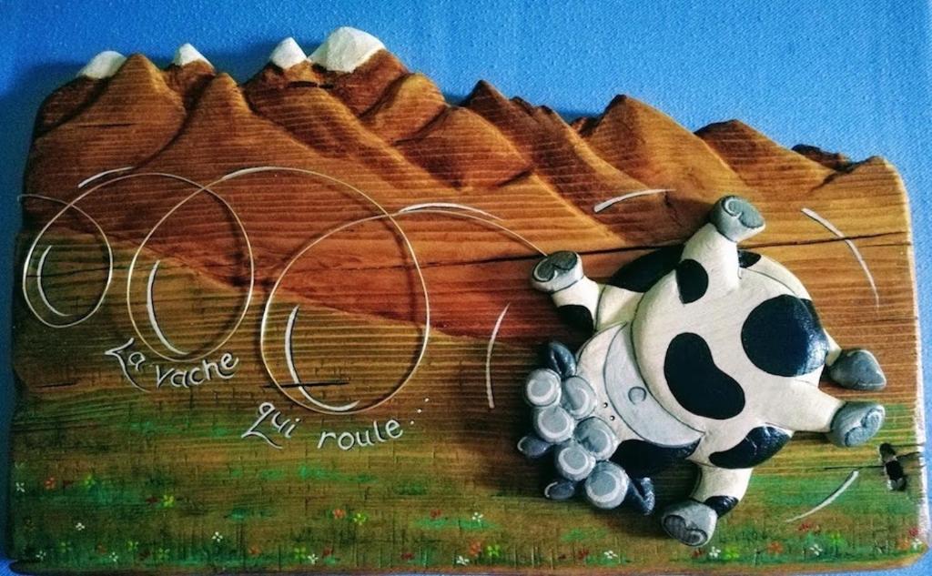 ein Bild eines Kuchens mit einer Kuh drauf in der Unterkunft La Vache Qui Roule -CIR Charvensod 0037 in Aosta