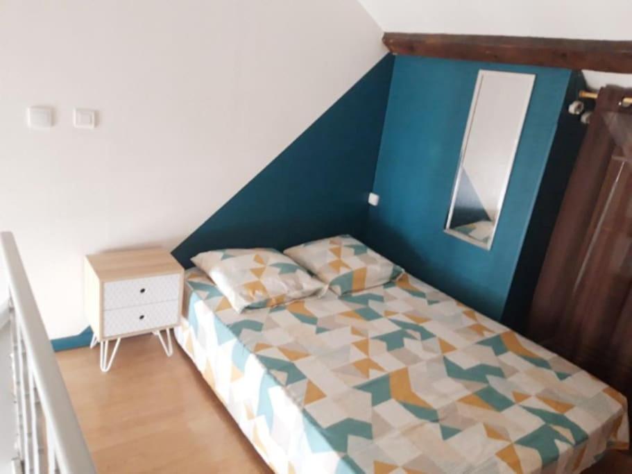 Łóżko lub łóżka w pokoju w obiekcie Le P'ti Pau - Centre de Pau - Appartement lit double