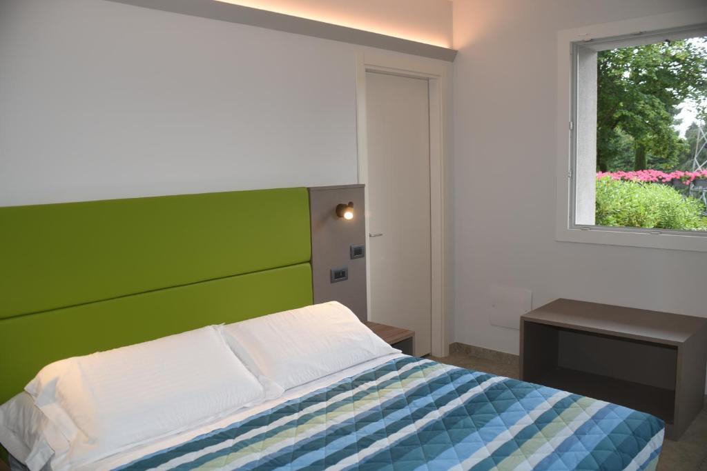 Postel nebo postele na pokoji v ubytování Casale al Foino