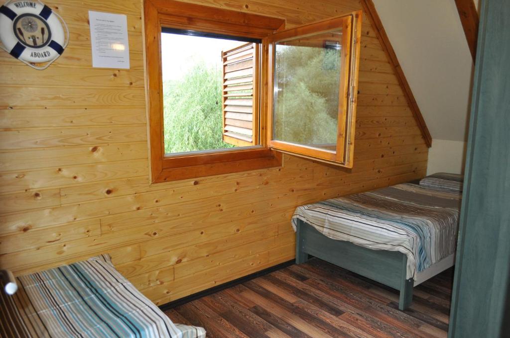 Postel nebo postele na pokoji v ubytování Casa Agapie