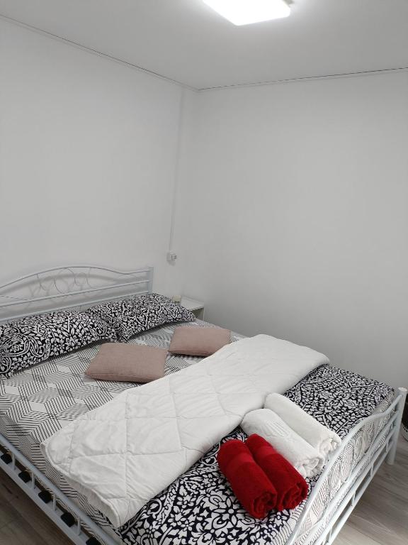 Postel nebo postele na pokoji v ubytování AMBIENT Geavidan 2