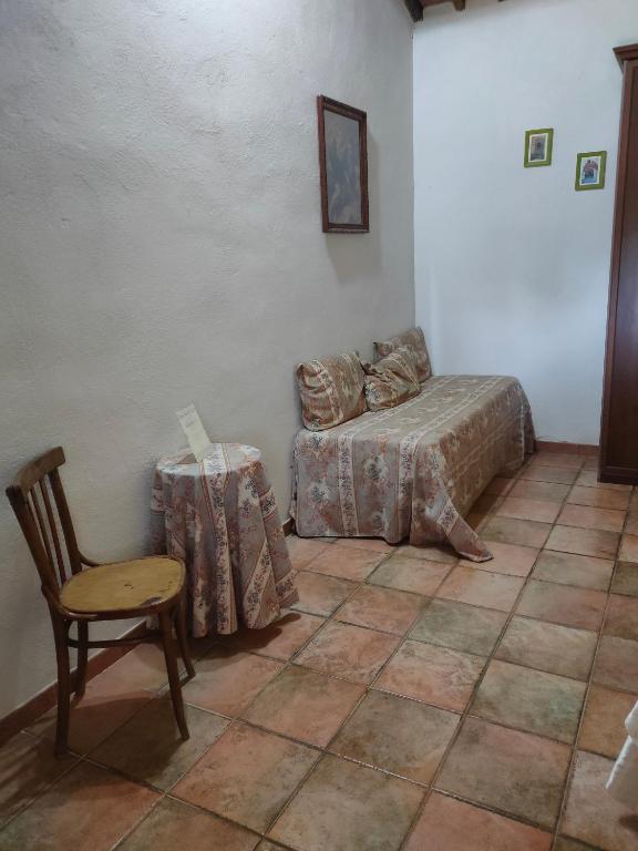 Postel nebo postele na pokoji v ubytování Bio Agriturismo Il Cavone