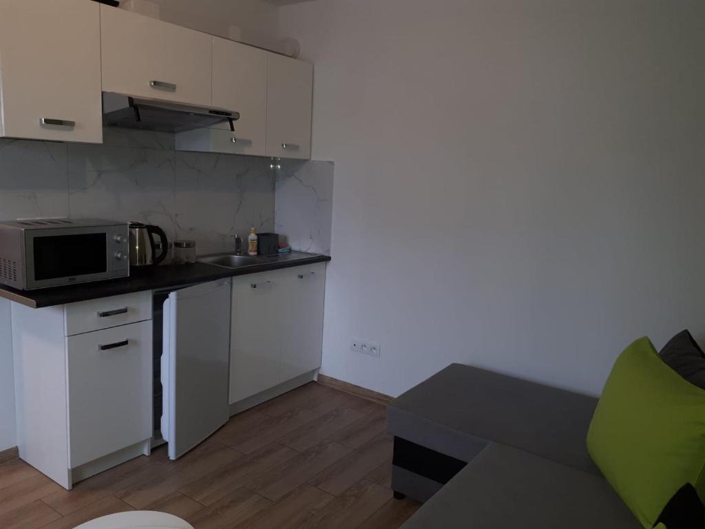 Kuchyň nebo kuchyňský kout v ubytování Cienisty Zakątek
