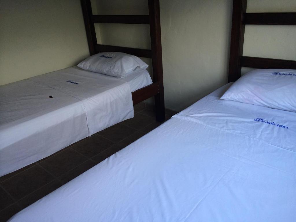 Postel nebo postele na pokoji v ubytování Desiderata Resort