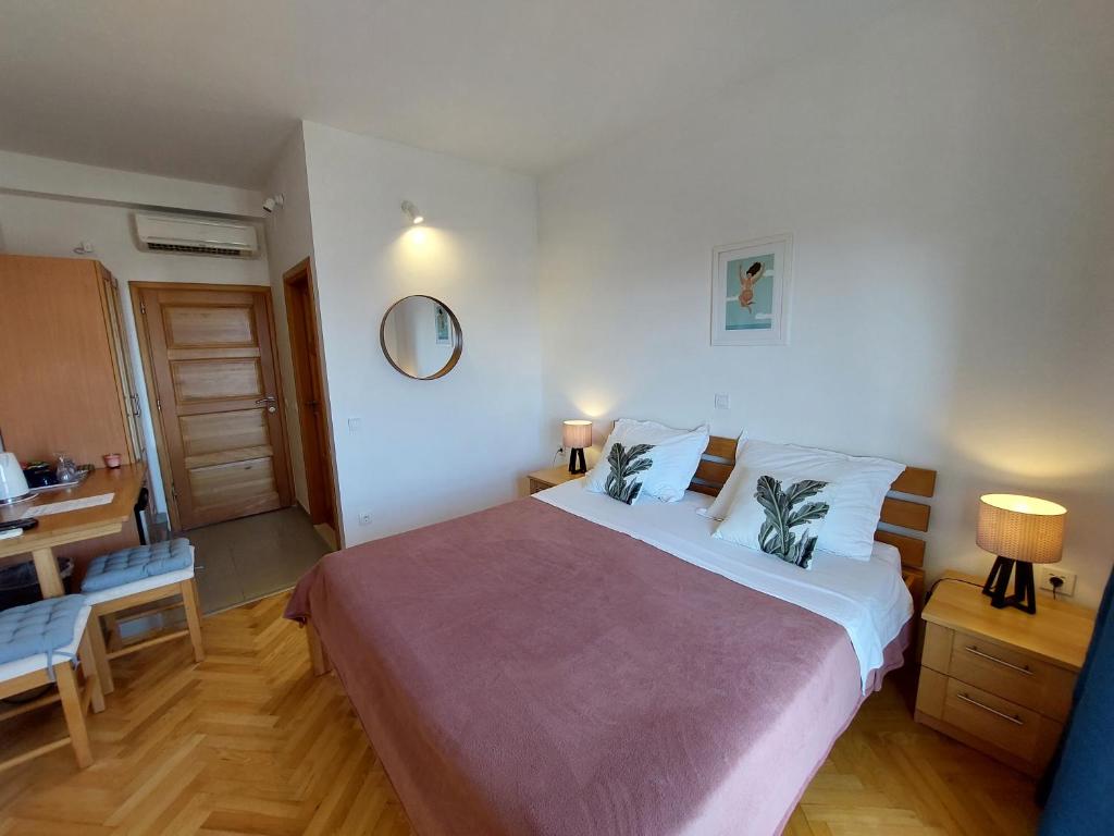Ένα ή περισσότερα κρεβάτια σε δωμάτιο στο Vila Luka