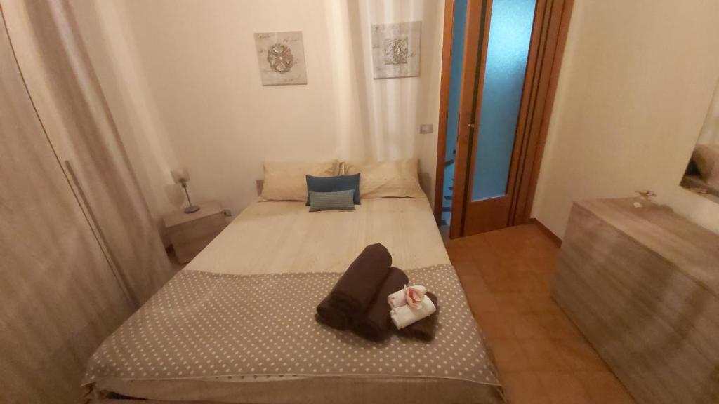Posteľ alebo postele v izbe v ubytovaní APPARTAMENTO BILOCALE GRAZIOSO ad Alba Adriatica