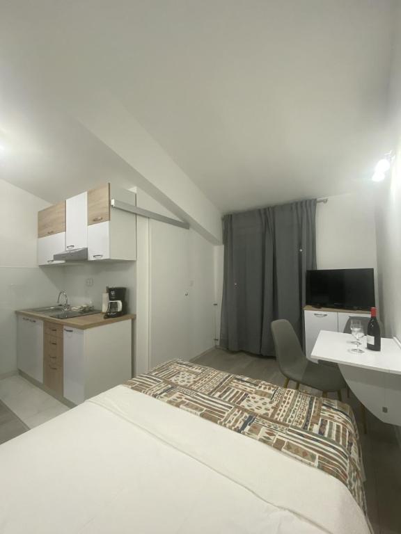 Posteľ alebo postele v izbe v ubytovaní Apartman Freja II