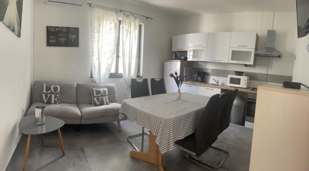 Kuchyň nebo kuchyňský kout v ubytování Apartment Greta