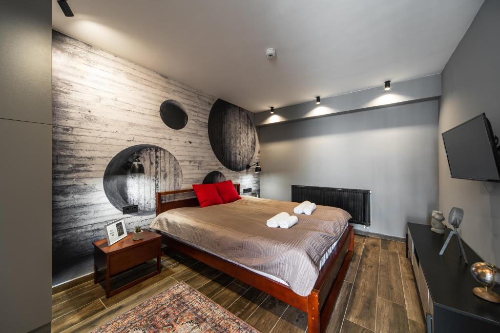 Postel nebo postele na pokoji v ubytování r12 Apartments