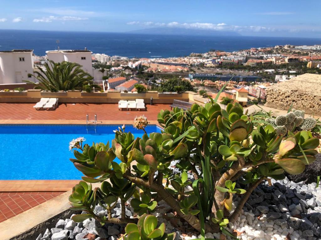 Bazén v ubytování Apartamento con impresionantes vistas y piscina nebo v jeho okolí