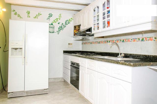 Kuchyň nebo kuchyňský kout v ubytování Mayorca Homestay
